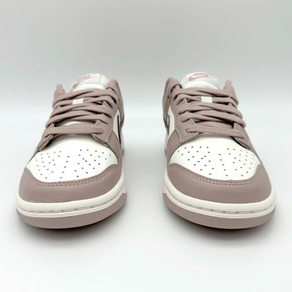 Der Nike Dunk Low "Sail Plum Eclipse" Sneaker ist eine Hommage an zeitlose Eleganz und urbanen Streetstyle. Mit seinem minimalistischen Design und hochwertigen Materialien setzt dieser Sneaker ein markantes Fashion-Statement.